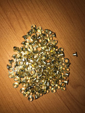 Ojillos de 3/16 Dorado contenido 200 piezas